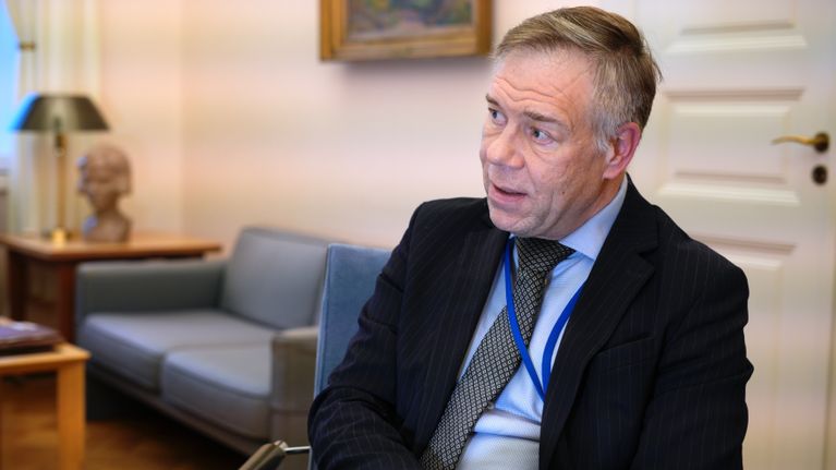 Permanent Secretary Juha Majanen pictured discussing national AI platforms