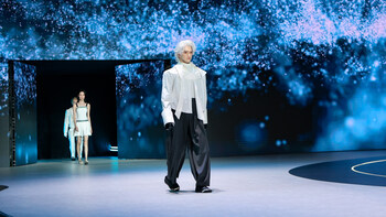 UBTECH Launches 'U1' bionic companion robot standing next to a developer at the Shenzhen launch event